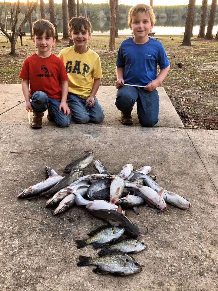 Left to Right: Kason Bozeman, Kolby Bozeman and Kolton Meeks recently had a successful day of fishing at Escambia County State Public Fishing Lake in Wing, Alabama.  Photo courtesy of Doug & Allie’s Fishing Post at Escambia County State Public Fishing Lake (also known as Leon Brooks Hines Lake)