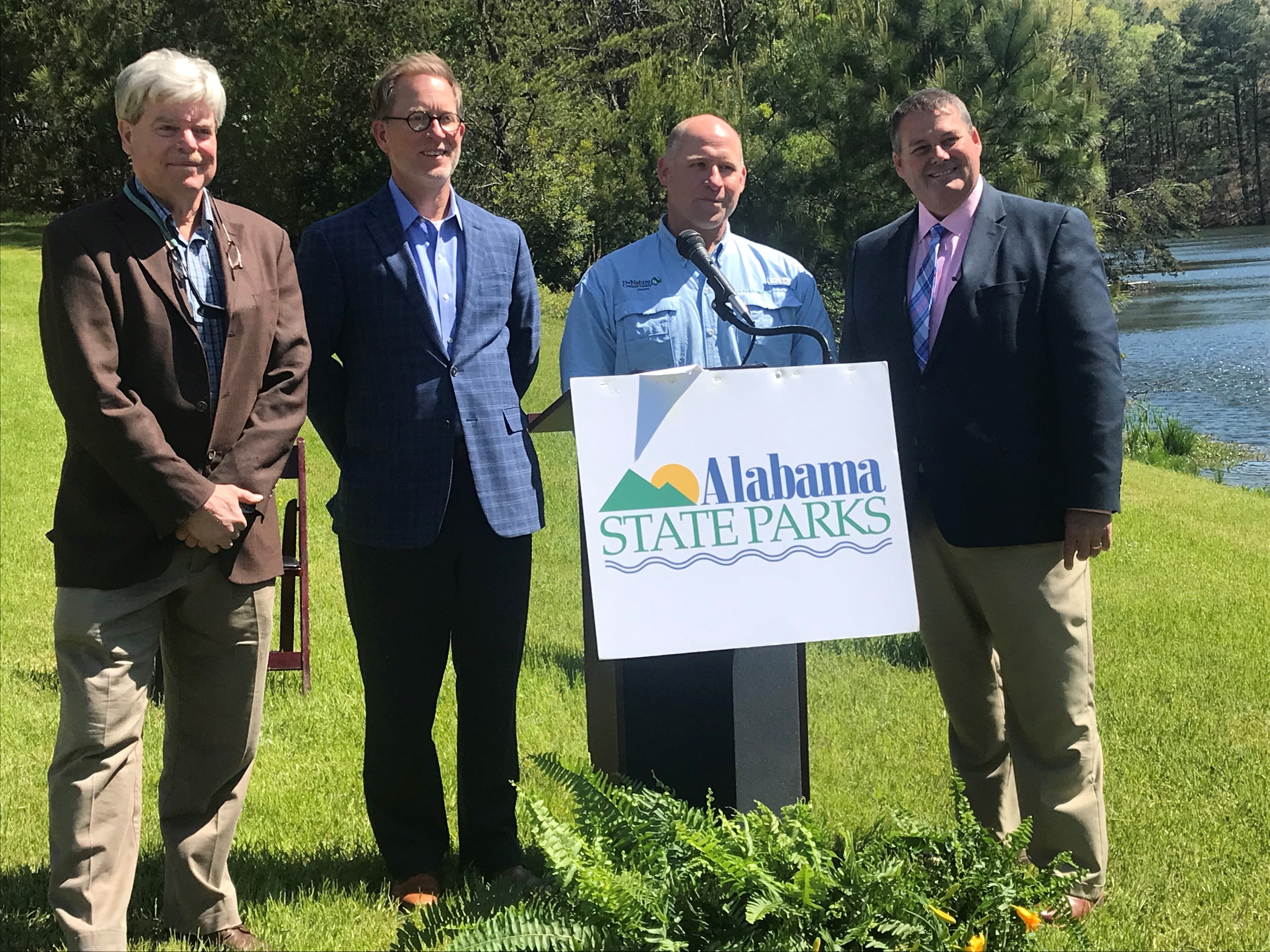 From left, Forever Wild Board Member Dr. James B. McClintock; David Walker, President and CEO of EBSCO Industries; Mitch Reid, Alabama State Director of The Nature Conservancy; and Chris Blankenship, Alabama Department of Conservation and Natural Resources Commissioner and Forever Wild Land Trust Chairman.