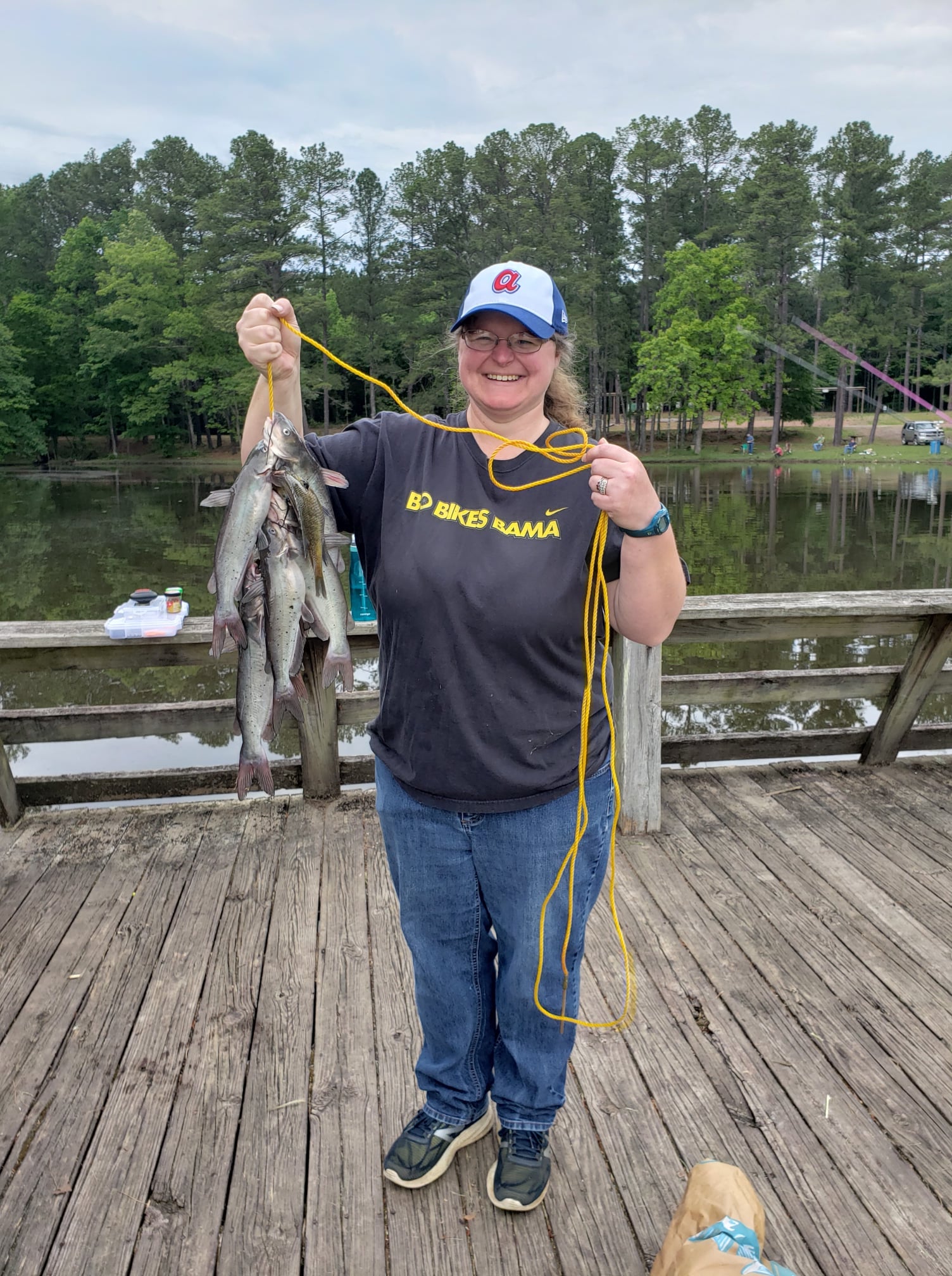 Jennifer Cohron shows off her catch at a recent Go Fish, Alabama! event at Walker County Public Fishing Lake.   Photo by Kasie McKee, ADCNR