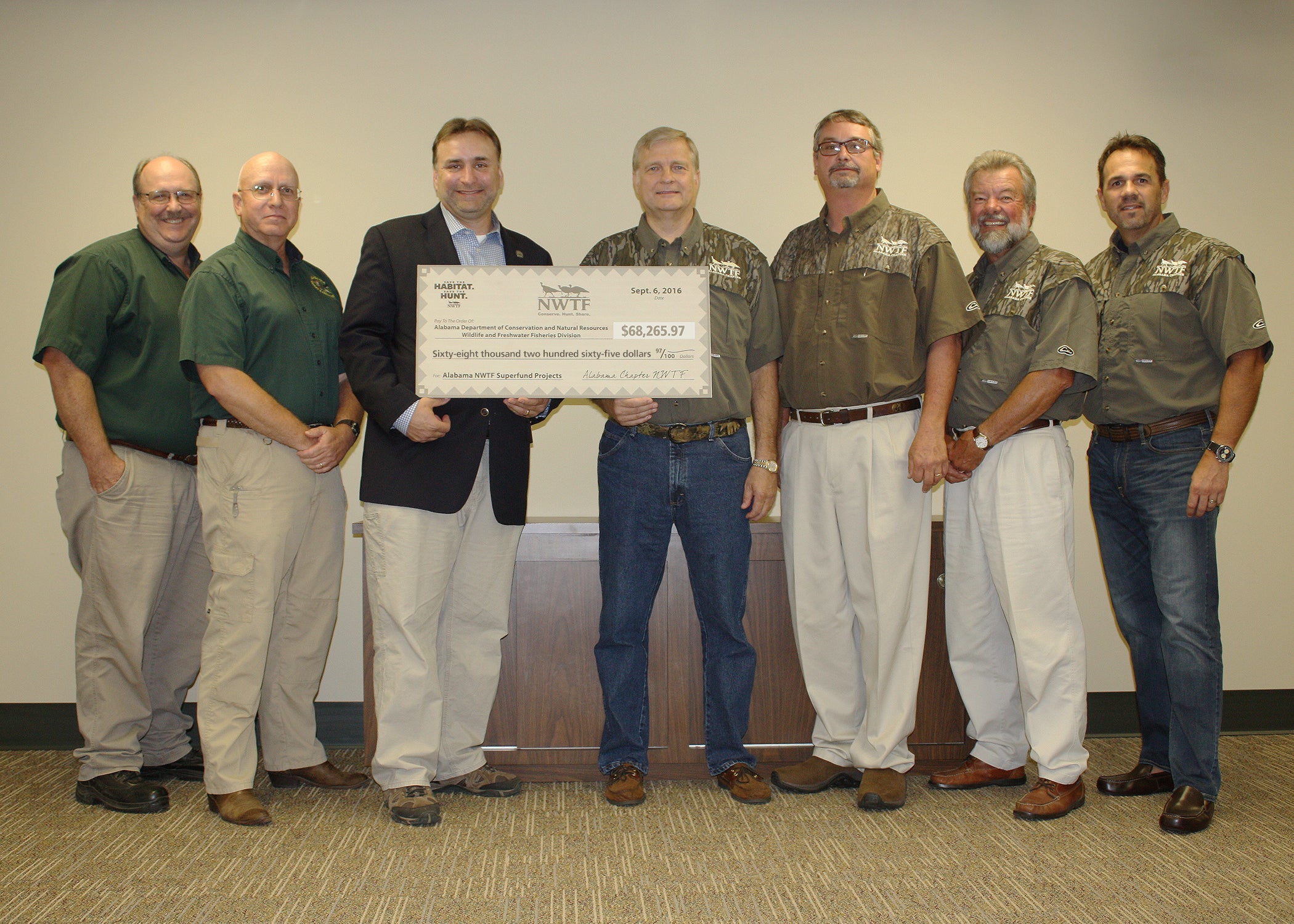 Photo (left to Right)  From WFF: Joel Glover, Steve Barnett and Chuck Sykes (WFF Director). From the Executive Committee of the Alabama Chapter NWTF Board of Directors: Craig Scruggs (State Chapter President), Craig Harris, Charlie Duckett and Scott Brandon. 