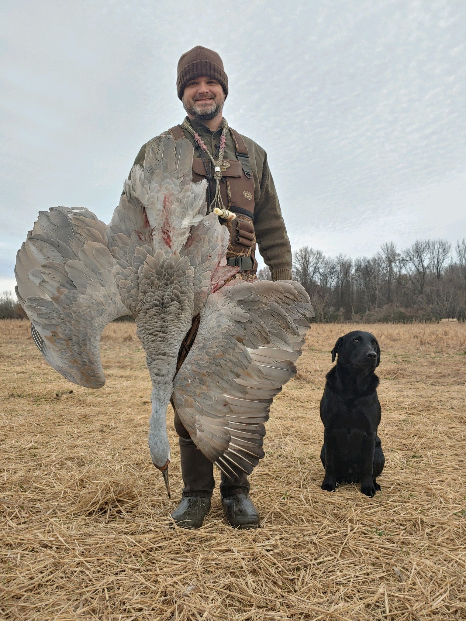 James Michael Moyer and Jack after a successful sandhill crane hunt during the 2020-2021 season.