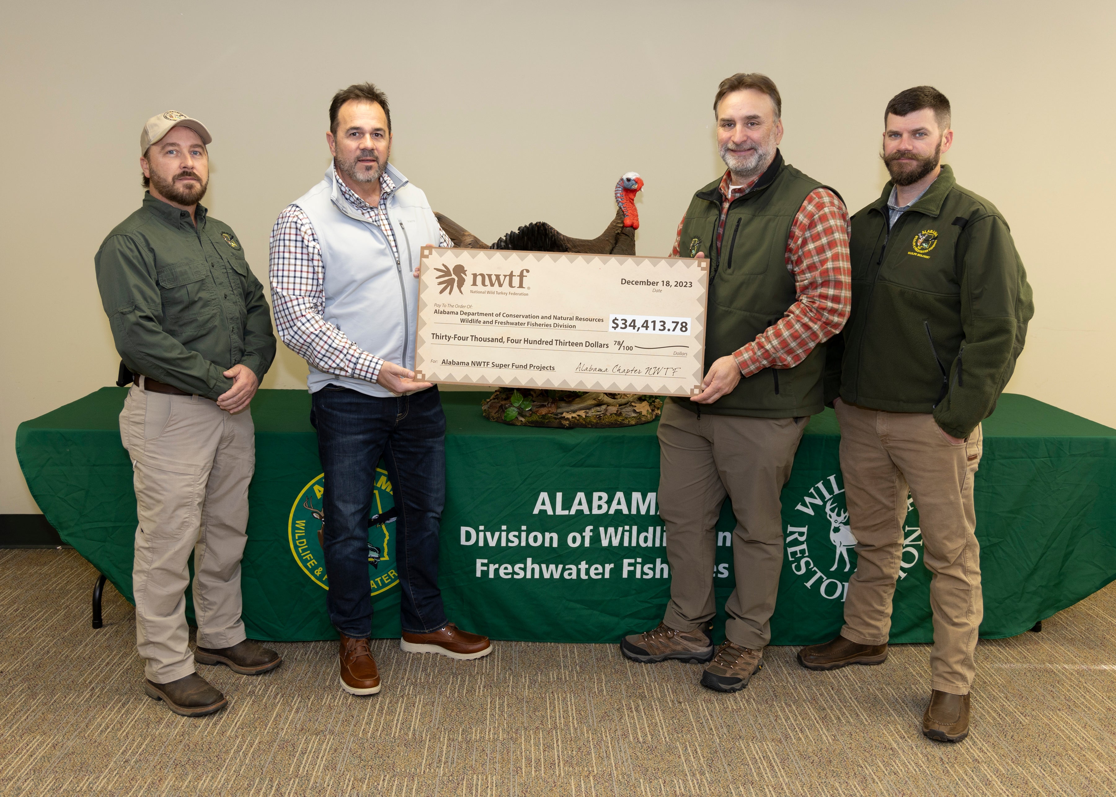 Photo L-R: Steven Mitchell, Supervising Wildlife Biologist; Scott Brandon, NWTF Chapter President; Chuck Sykes, Director, Wildlife and Freshwater Fisheries; Seth Madox, Assistant Chief, Wildlife Section