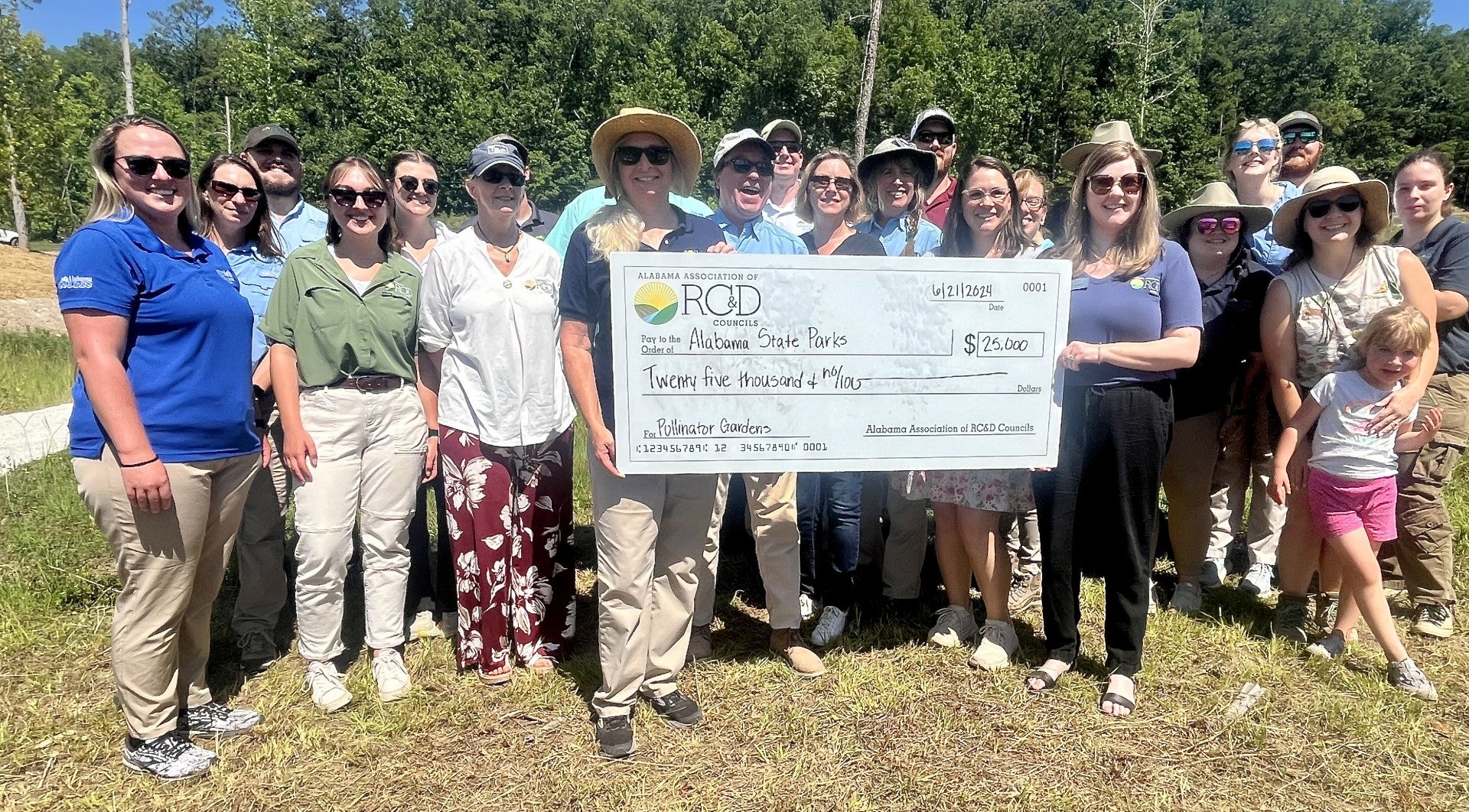 The Alabama Association of Resource, Conservation and Development (RC&D) Councils presented a $25,000 grant to Alabama State Parks on Friday during the Pollinator Festival at Oak Mountain State Park